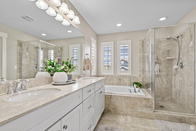 10426 S Kestrel Rise Rd, South Jordan, UT 84009 - bathroom featuring a stall shower, a bath, double vanity, recessed lighting, and tile patterned floors