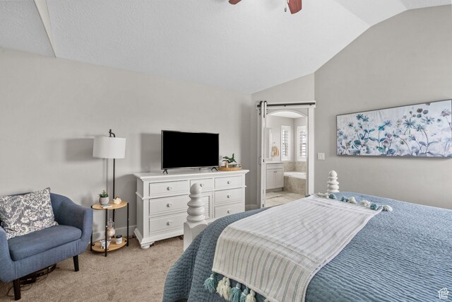 10426 S Kestrel Rise Rd, South Jordan, UT 84009 - bedroom featuring vaulted ceiling, light colored carpet, connected bathroom, a ceiling fan, and arched walkways