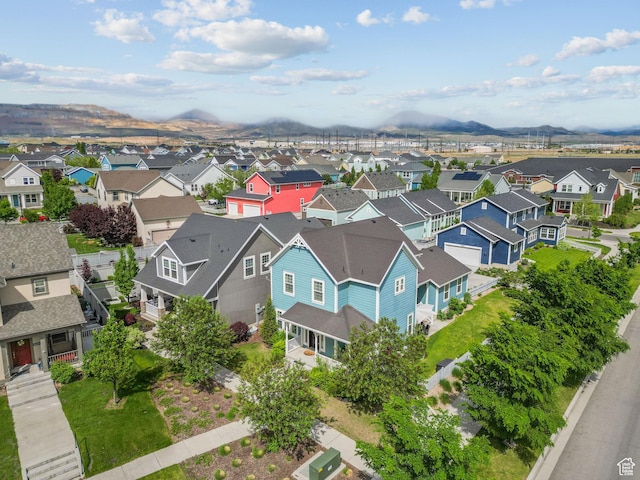 aerial view of residential area with a mountain backdrop