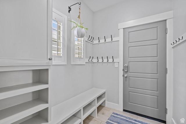 mudroom featuring baseboards