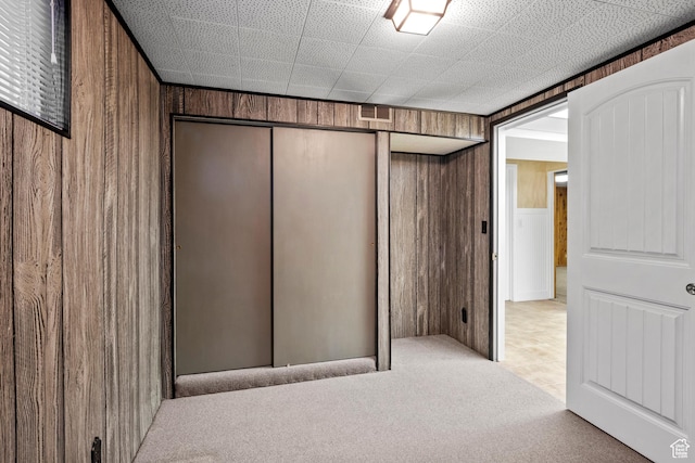 7479 S Randall Cir, Midvale, UT 84047 - interior space with wooden walls and carpet flooring