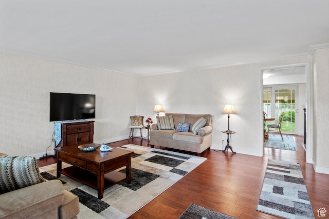 7479 S Randall Cir, Midvale, UT 84047 - living area featuring crown molding, wood finished floors, and baseboards