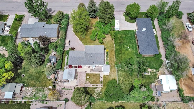 aerial view of property's location with nearby suburban area