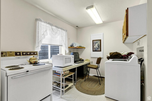 washroom with washer / dryer and an office area