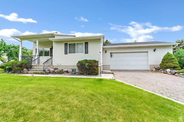 view of front of house with gravel driveway, an attached garage, and a front yard