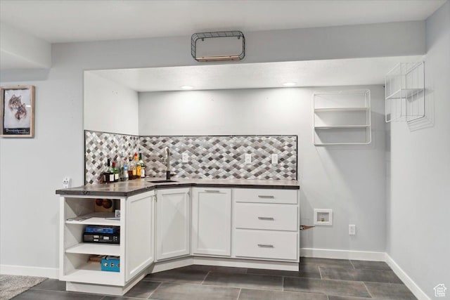 1254 N 150 E, Harrisville, UT 84404 - kitchen featuring open shelves, a sink, dark countertops, backsplash, and white cabinets