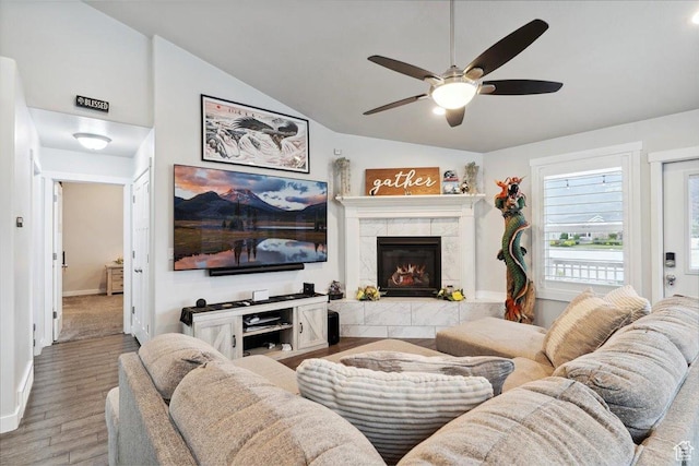 1254 N 150 E, Harrisville, UT 84404 - living area with lofted ceiling, light wood-style floors, a ceiling fan, baseboards, and a fireplace