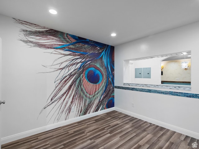 3388 W Rocky Peak Way S, Jordan, UT 84095 - detailed view of wood finished floors, baseboards, recessed lighting, and electric panel
