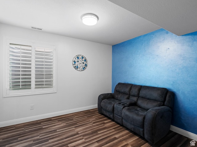 3388 W Rocky Peak Way S, Jordan, UT 84095 - living room with dark wood finished floors, baseboards, and a textured ceiling