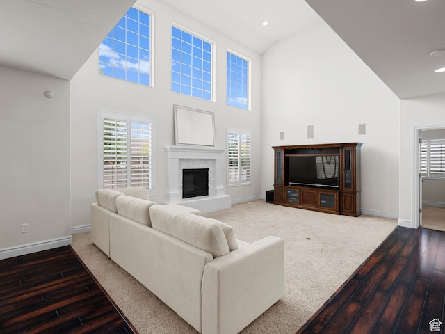 3388 W Rocky Peak Way S, Jordan, UT 84095 - living room featuring hardwood / wood-style floors, high vaulted ceiling, healthy amount of natural light, baseboards, and recessed lighting