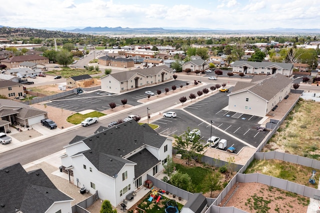 aerial view of residential area with mountains