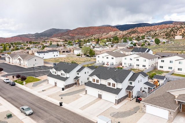 aerial perspective of suburban area with a mountain backdrop