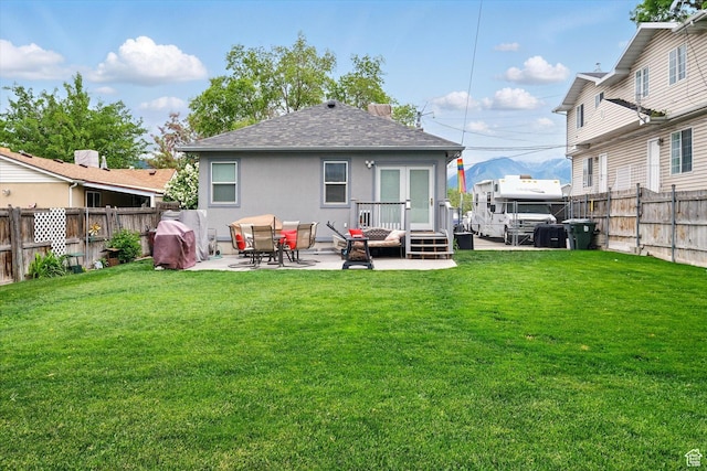 3426 S 500 E, South Salt Lake, UT 84106 - rear view of house with roof with shingles, a patio area, and stucco siding