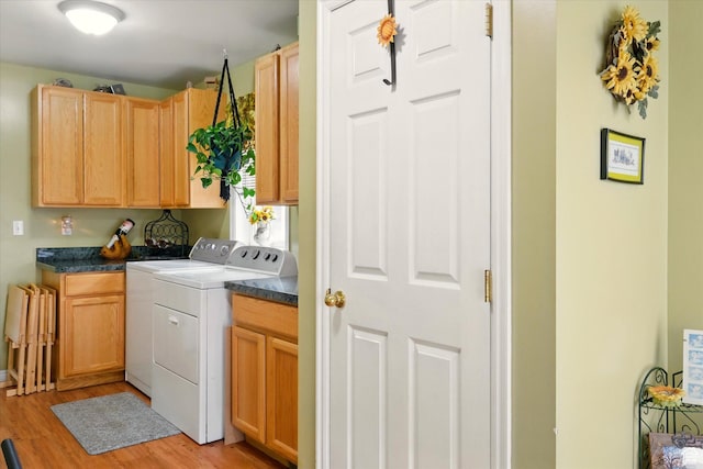 3426 S 500 E, South Salt Lake, UT 84106 - laundry room featuring cabinet space, light wood finished floors, and washing machine and clothes dryer