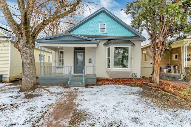 915 W 300 S, Salt Lake City, UT 84104 - victorian house featuring a porch and stucco siding