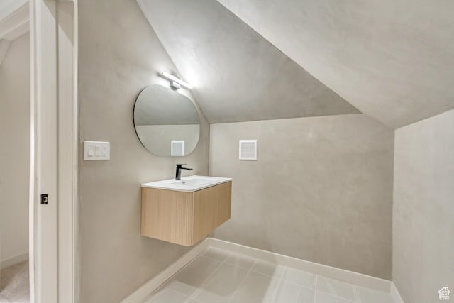 915 W 300 S, Salt Lake City, UT 84104 - bathroom with vaulted ceiling, vanity, and baseboards