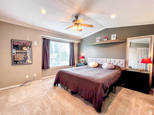 bedroom with ornamental molding, vaulted ceiling, light carpet, baseboards, and a ceiling fan