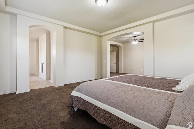 417 E Stonehedge Cir, Washington, UT 84780 - carpeted bedroom with arched walkways and baseboards