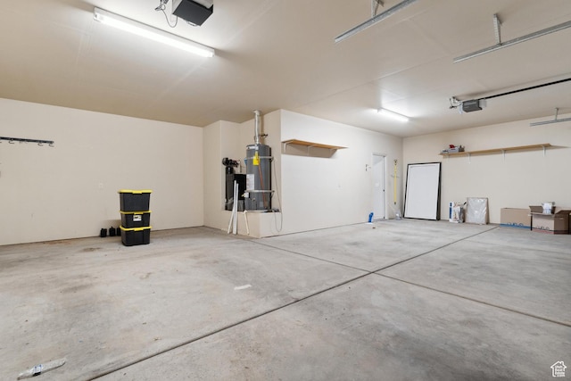 417 E Stonehedge Cir, Washington, UT 84780 - garage with strapped water heater and a garage door opener