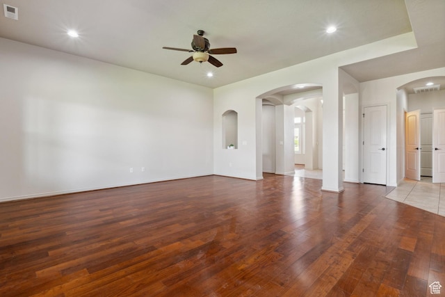417 E Stonehedge Cir, Washington, UT 84780 - empty room with a ceiling fan, arched walkways, wood finished floors, recessed lighting, and baseboards