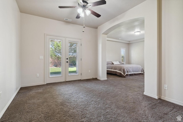 417 E Stonehedge Cir, Washington, UT 84780 - bedroom featuring access to exterior, french doors, carpet flooring, and arched walkways