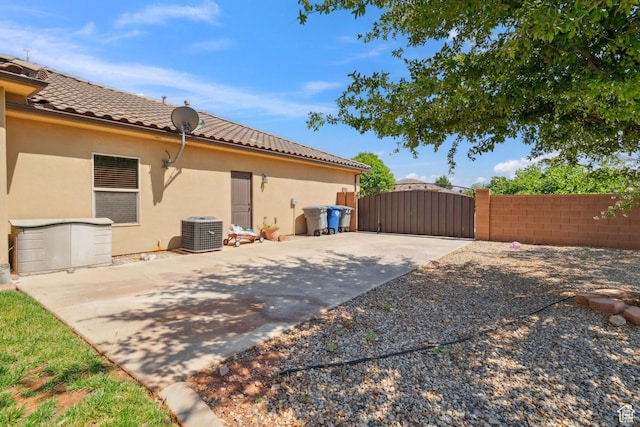 417 E Stonehedge Cir, Washington, UT 84780 - view of yard featuring a gate and central AC unit