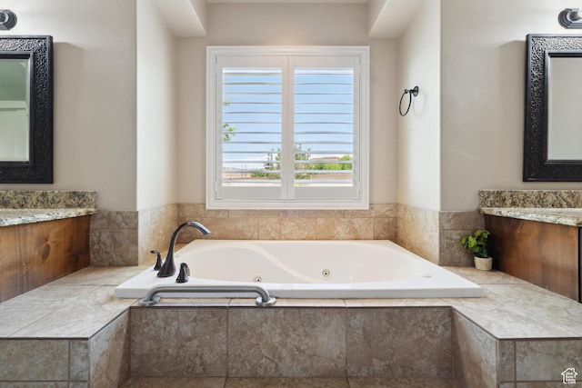 417 E Stonehedge Cir, Washington, UT 84780 - bathroom featuring vanity and a tub with jets