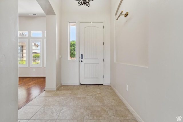 417 E Stonehedge Cir, Washington, UT 84780 - foyer featuring arched walkways and baseboards