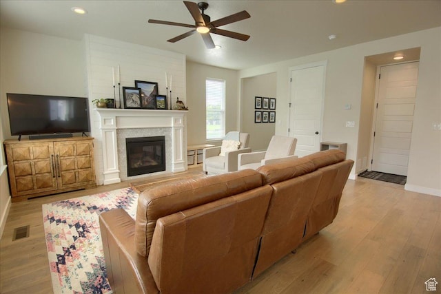 352 N 75 E, Kaysville, UT 84037 - living area with a ceiling fan, light wood-type flooring, a glass covered fireplace, baseboards, and recessed lighting