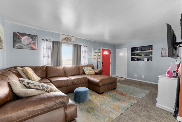 8521 W 3100 S, Magna, UT 84044 - living room with carpet floors, built in features, and baseboards