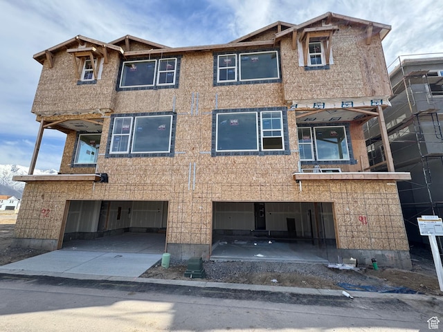 883 W Hobble Creek Ct S Unit 91, Springville, UT 84663 - view of front facade featuring an attached garage and concrete driveway