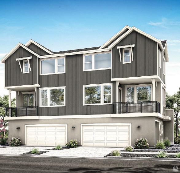 883 W Hobble Creek Ct S Unit 91, Springville, UT 84663 - view of front of house featuring a garage, driveway, and board and batten siding