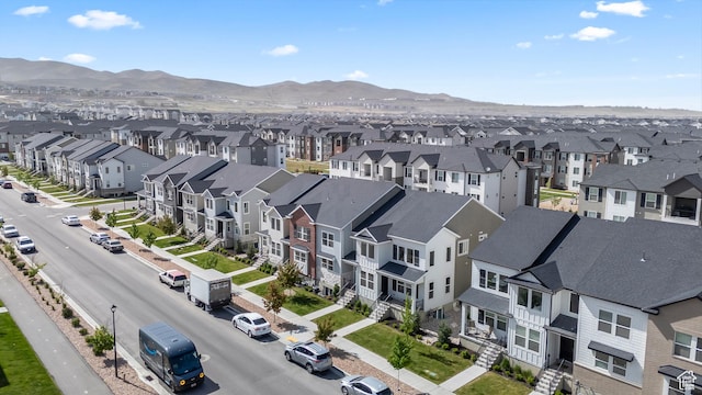 aerial perspective of suburban area with a mountain backdrop