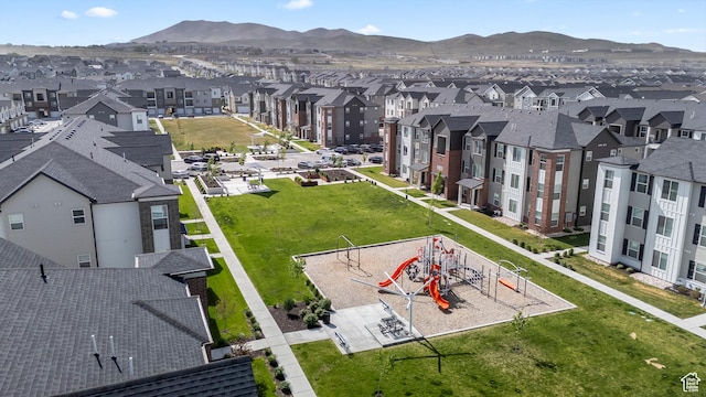 aerial perspective of suburban area with a mountain backdrop
