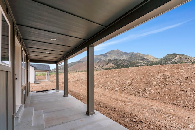 view of patio with a mountain view