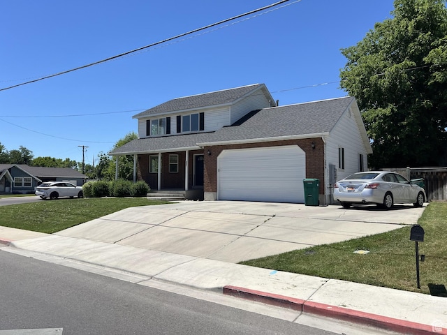 view of front of home with a garage, brick siding, concrete driveway, covered porch, and a front yard