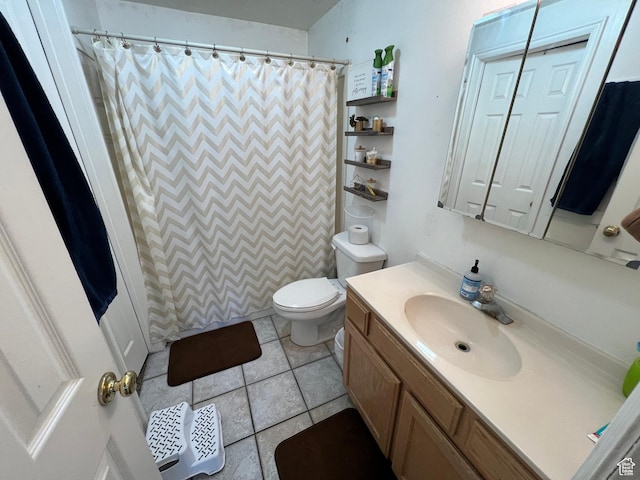 full bath featuring toilet, vanity, a shower with shower curtain, and tile patterned flooring