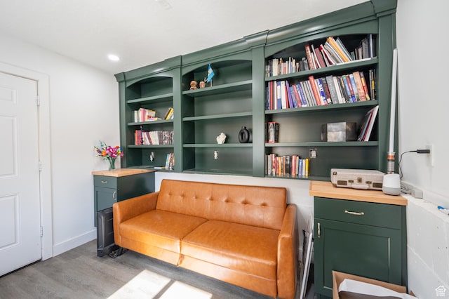 sitting room featuring wood finished floors