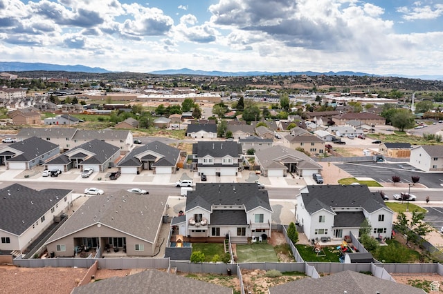 aerial view of residential area with a mountainous background