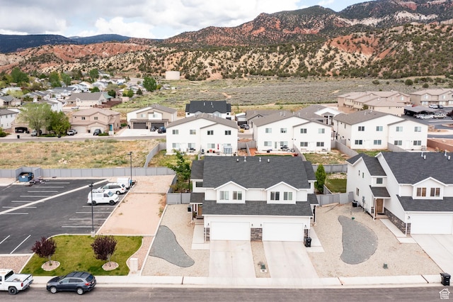 aerial perspective of suburban area with mountains