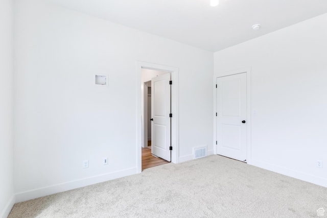 676 E 2450 N, North Logan, UT 84341 - unfurnished room featuring carpet floors and baseboards