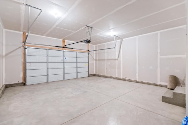 676 E 2450 N, North Logan, UT 84341 - garage featuring a garage door opener