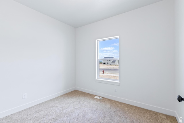 676 E 2450 N, North Logan, UT 84341 - unfurnished room featuring carpet and baseboards