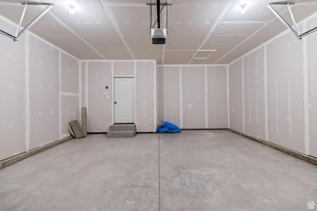 676 E 2450 N, North Logan, UT 84341 - garage featuring a garage door opener