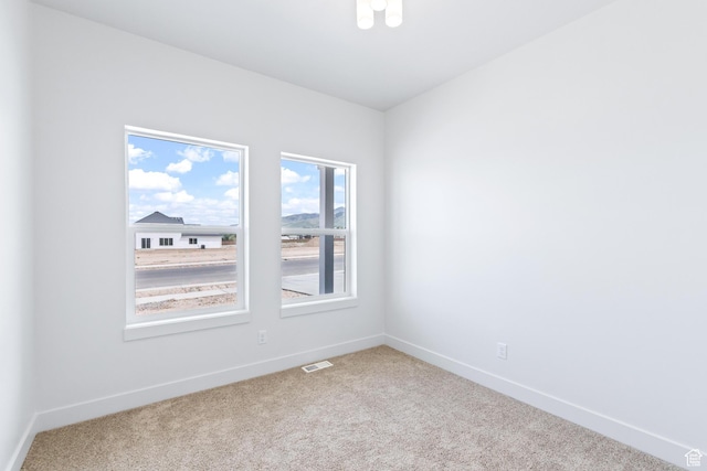 676 E 2450 N, North Logan, UT 84341 - carpeted empty room featuring baseboards
