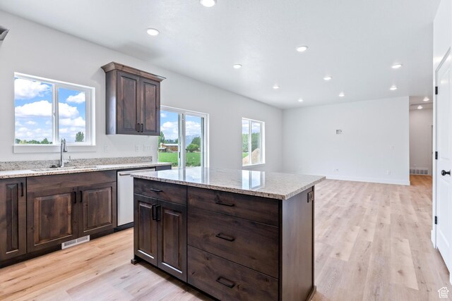 676 E 2450 N, North Logan, UT 84341 - kitchen featuring dishwasher, a sink, light wood-style flooring, recessed lighting, and dark brown cabinetry
