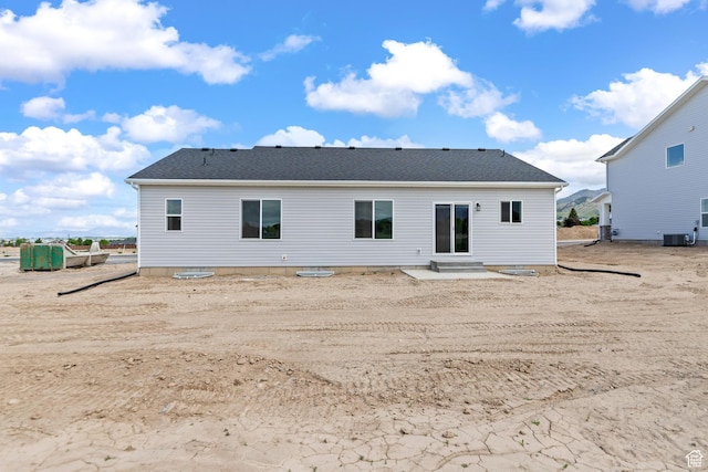 676 E 2450 N, North Logan, UT 84341 - back of property with central AC and entry steps