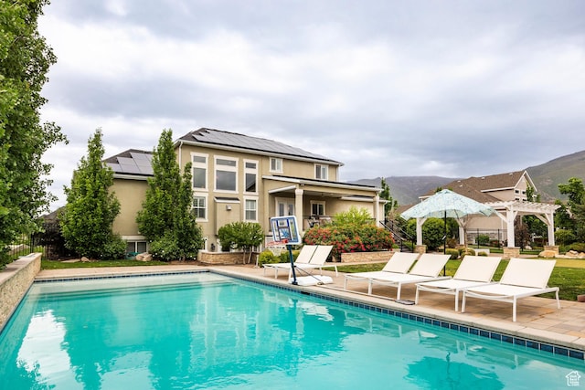 1309 W Atrium Ct W, Farmington, UT 84025 - outdoor pool featuring a pergola, a patio area, and fence