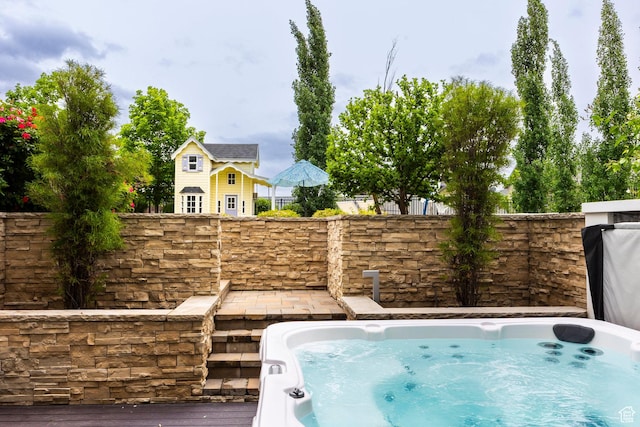 1309 W Atrium Ct W, Farmington, UT 84025 - view of swimming pool with an outdoor hot tub and fence