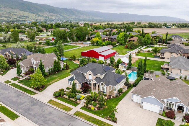 1309 W Atrium Ct W, Farmington, UT 84025 - aerial view of residential area featuring a mountainous background